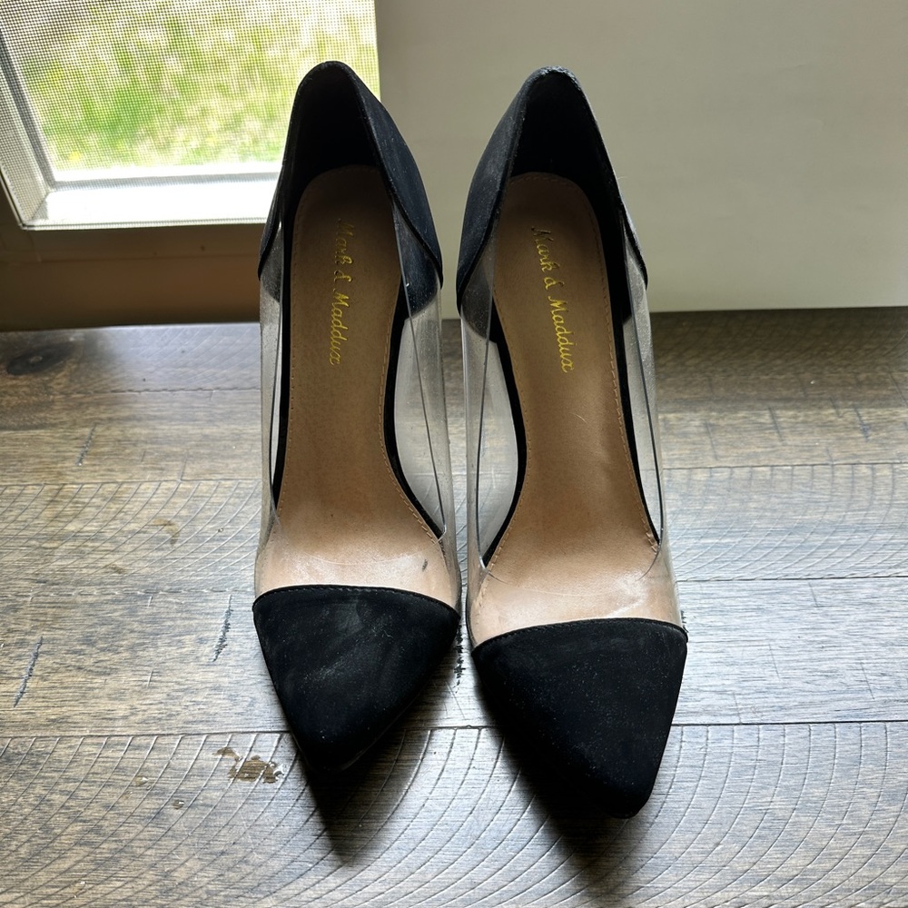 Beautiful black pump with clear sides. Size 7.5